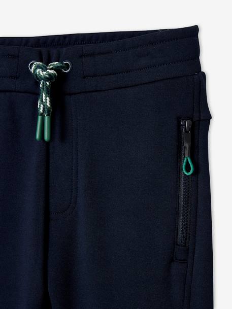 Pantalón de deporte para niño, tejido técnico AZUL OSCURO LISO CON MOTIVOS 