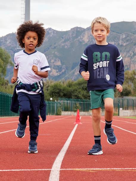 Pantalón de deporte para niño, tejido técnico AZUL OSCURO LISO CON MOTIVOS 