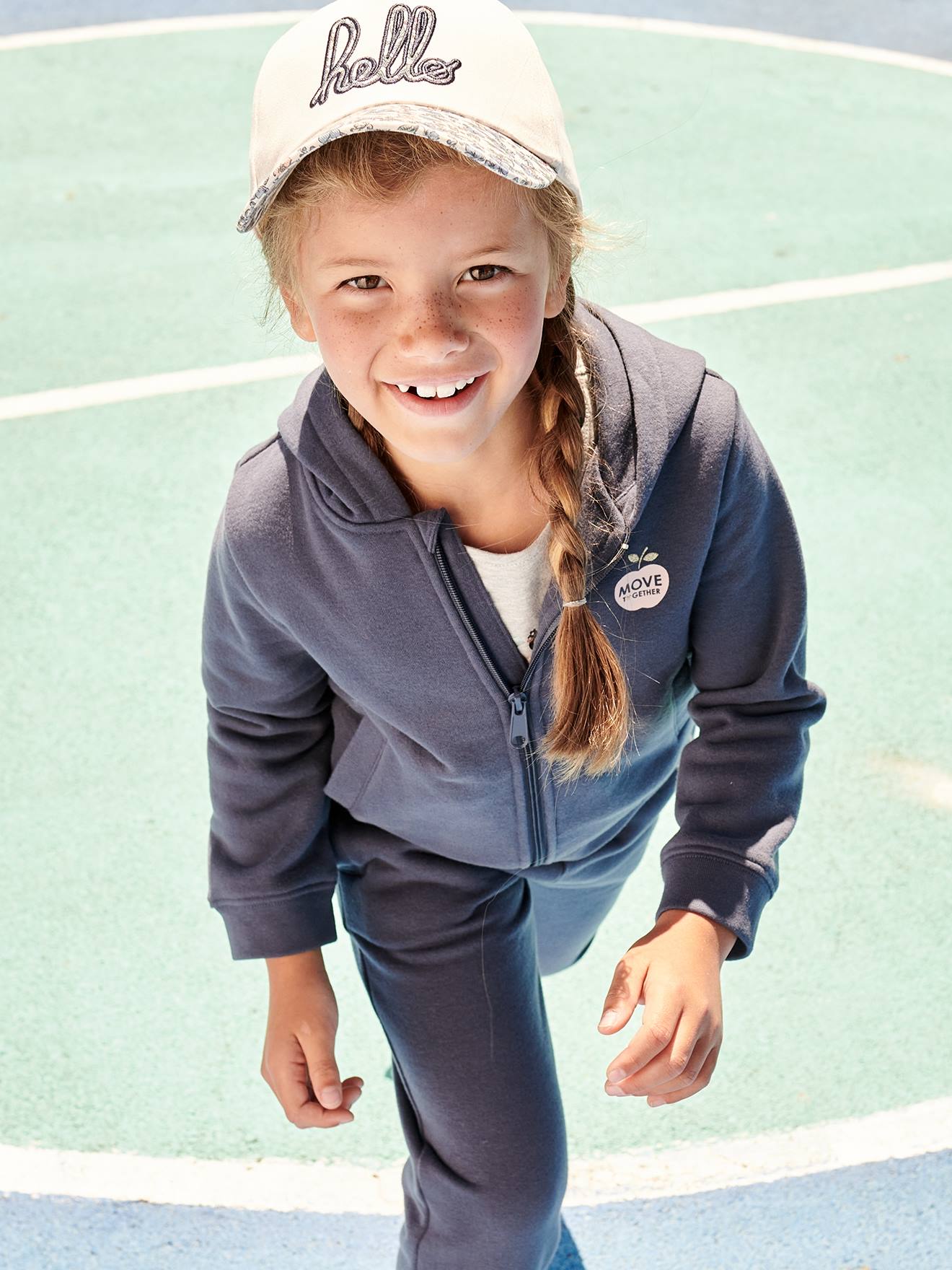 Sudadera con cremallera y capucha deportiva nina azul medio liso con motivos