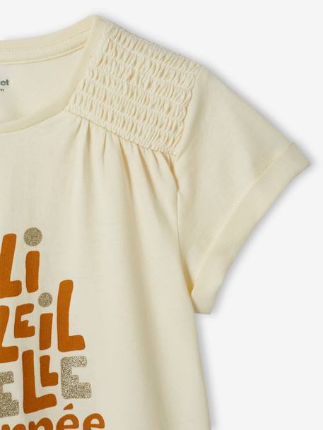 Camiseta con texto irisado y hombros con smocks para niña crudo 