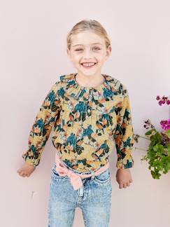 Blusa con estampado de flores para niña